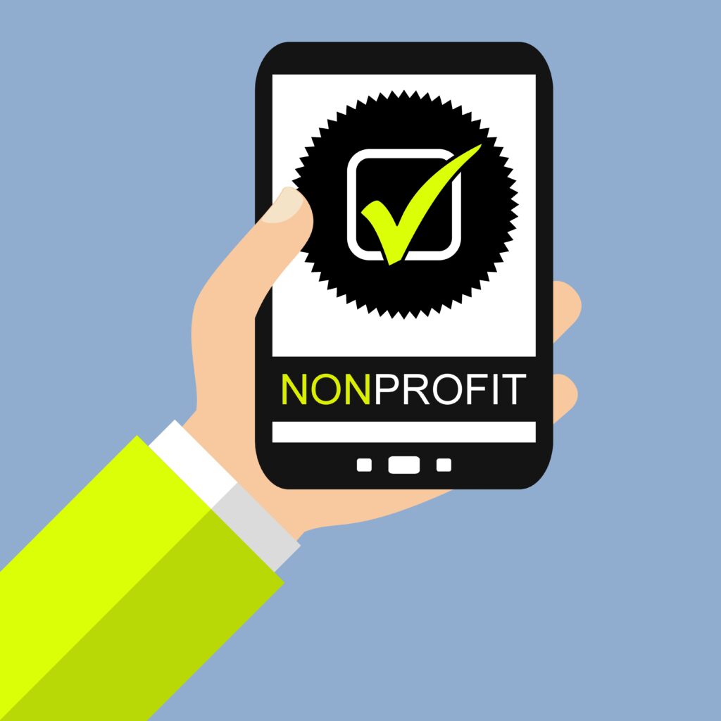 Hand mit Smartphone: Non Profit - Flat Design